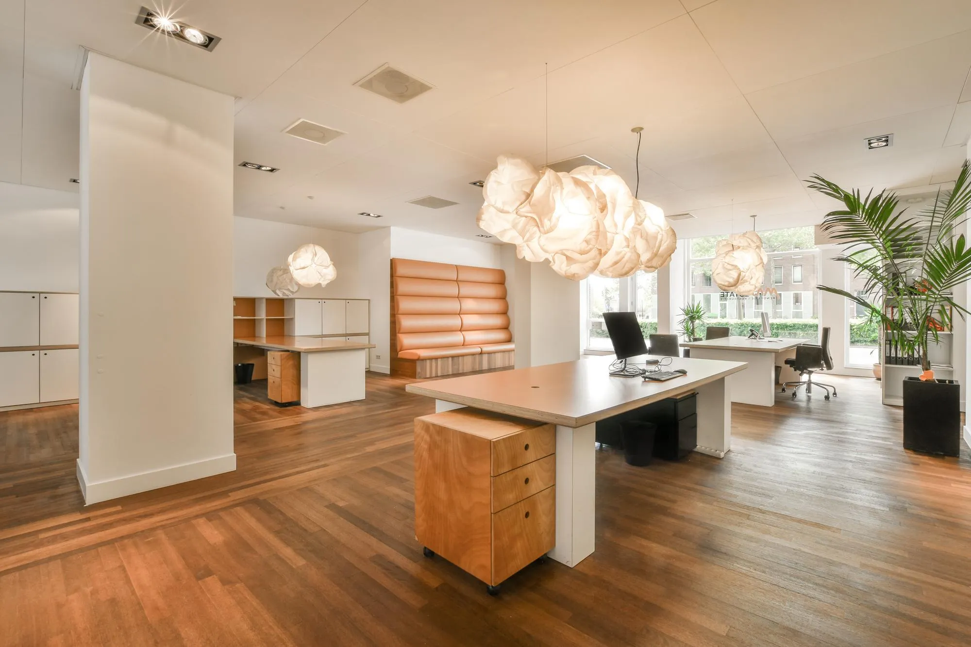 Neutral Flooring With Warm Wood Or Polished Stone