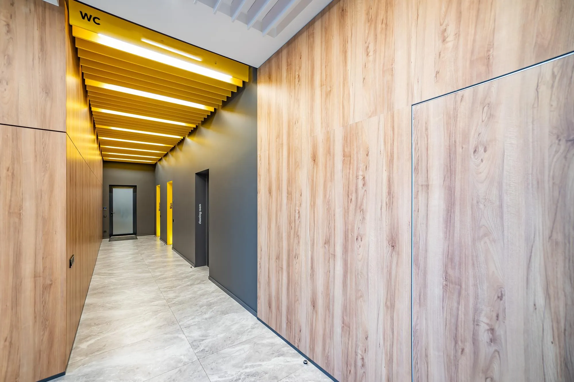 Use Vertical Floor-To-Ceiling Wood Slats